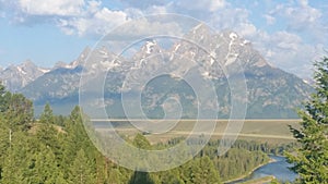 Clouds over the Grand Teton mountains at sunrise