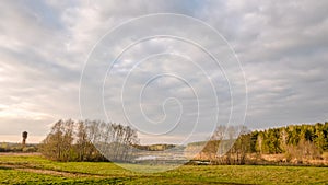 Clouds over the lake. Time before sunset
