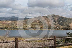 Clouds over a Mountain Range and Lake in Chula Vista, California