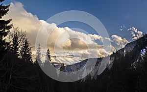 Clouds over mountain ridge