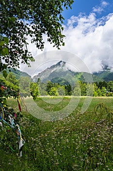 clouds over the mountains. Beautiful mountain landscape. Forest on a sunny summer day. photo