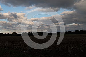 Clouds over a mowed field in geeste emsland germany