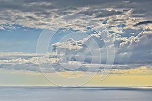 Clouds over ocean horizon