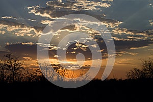 Clouds over pounding at sunset, Botswana