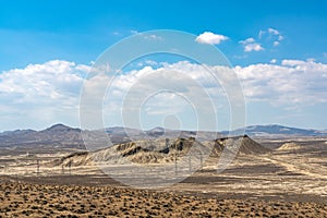 Clouds over rocks in a desert area