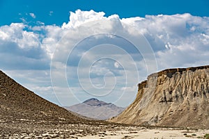 Clouds over rocks in a desert area