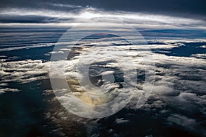 Clouds over the sea or ocean and sun reflection in water. Aerial view of the Irish Sea