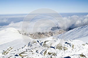 Clouds over snow winter mountain, Bulgaria