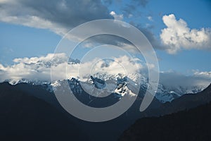 Clouds over the snowcapped mountains, Himalayas, Uttarakhand, In