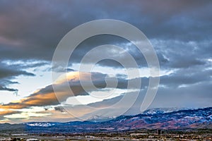 Clouds over Snowcapped Mt Rose and Slide mountain at sunrise above Reno, Nevada