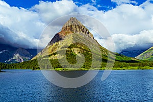 0000316 Clouds over Swiftcurrent Lake`s Grinnell Point at Glacier National Park Montana 5043 photo