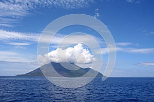 Clouds over volcanic island