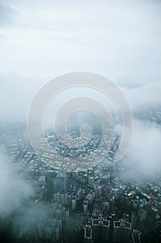 Clouds overlooking Taipei 101 Tower in Taipei on King