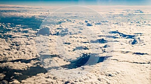 Clouds through plane window