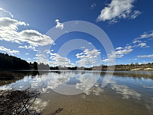 Clouds reflected at Loire river in the Loire valley in France, Europe