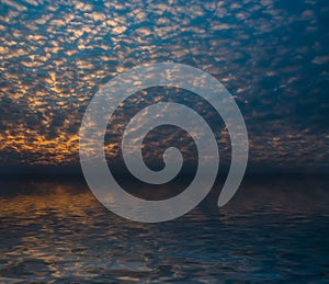 Clouds reflected in water.