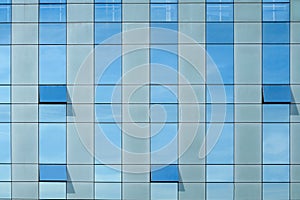 Clouds Reflected in Windows of Modern Office Building.