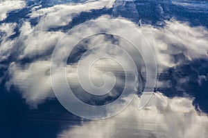 Clouds Reflections on Metallic Surface