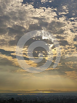 Clouds refract light with blue skies