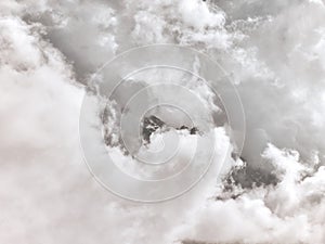 Clouds revealing snow covered Jebel Toubkal massif