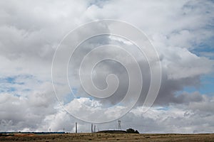 Clouds rising over a reservoir.