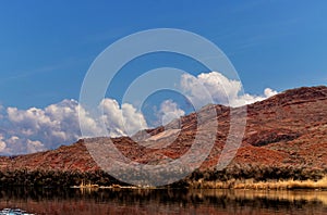 Clouds roll over the hills near the Colorado river - Lees Ferry landing, Page, AZ, USA