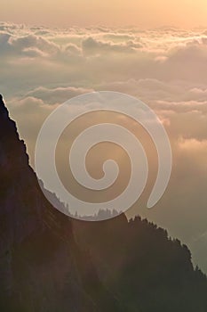 The clouds seen from above on the mountain. alpine sea at the horizon