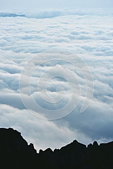 The clouds seen from above on the mountain. alpine sea at the horizon