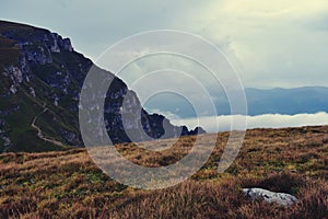 The clouds seen from above on the mountain. alpine sea at the horizon