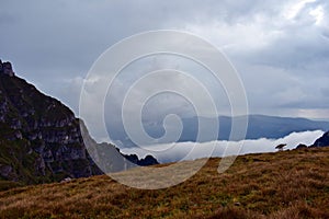 The clouds seen from above on the mountain. alpine sea at the horizon