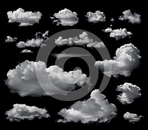 Clouds set isolated on black background. White cloudiness, mist or smog background