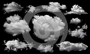 Clouds set isolated on black background. White cloudiness, mist or smog background