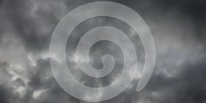 Brooding dark cloudy sky threatening rain