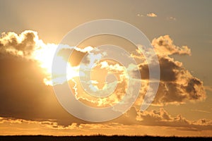 Clouds silver lining in colorful sunset sky