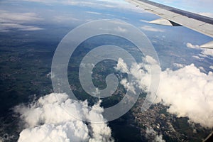 Clouds sky above the earth from airplane