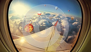 Clouds ,sky and Balloons as seen through window of aircraft