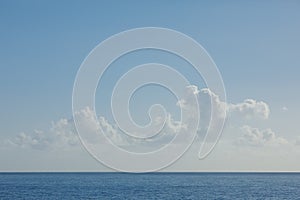 Clouds on the sky and blue sea, minimalism nature background