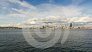 Clouds and sky over Seattle WA city skyline from Alki Beach WA 4k UHD time lapse