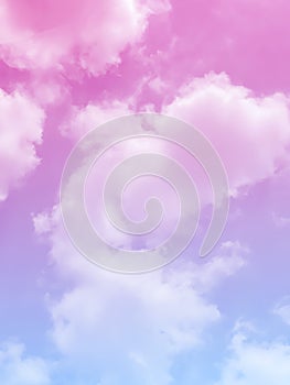 Clouds and sky with pastel rainbow background which is a blend of pink and purple colors