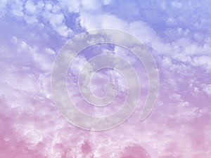 Clouds and sky with pastel rainbow background which is a blend of pink and purple colors