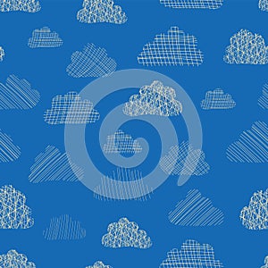 Clouds in the sky seamless vector pattern background. Beige silhouettes of doodle textured clouds on a blue background. Great for