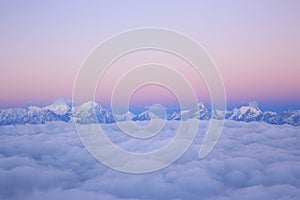 Clouds and snow mountain landscape