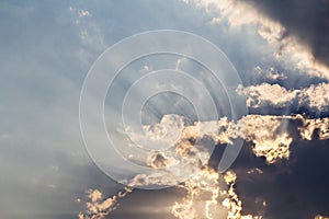 Clouds and sunbeam on blue sky