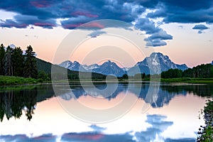 Clouds and Sunrise Skies Linger Over Grand Teton