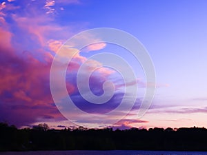 Clouds threatening rose at sunset