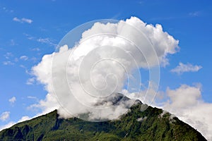 Clouds on top of hills