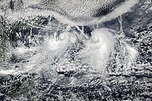 Clouds with tornadoes, view from space