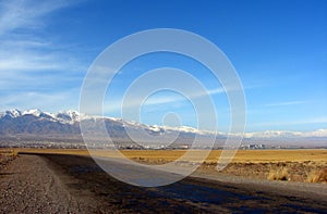 Clouds and a town in Issyk Kul