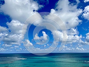 Clouds Travel in a Deep Blue Sky Promising Fair Weather Over the Ocean