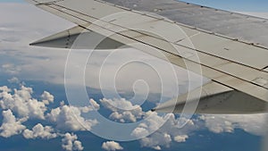 Clouds under the wing of the aircraft.
